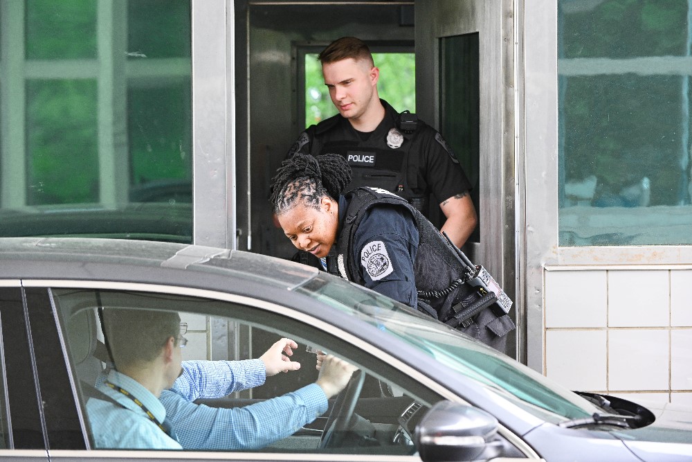 Police Officers in front of building Police Officers in front of building